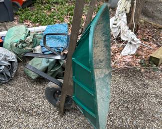 Wheelbarrow, tarps galore