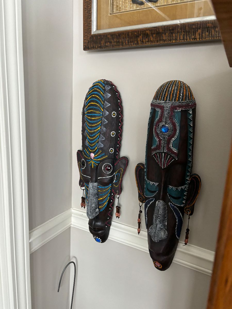 Amazing wood masks circa 60's-70's per family.