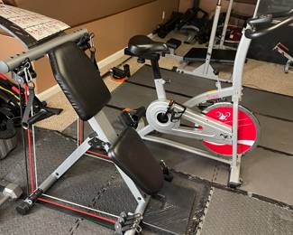 Lots of gym equipment