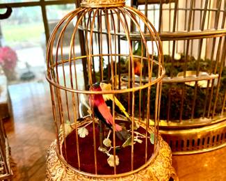Small brass musical bird cage