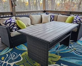 Easy Isle Nuvella Outdoor 3 Piece Sectional set, Dark Brown/Beige.  Also 
Miami Palms Blue-Deep Green Indoor/
Outdoor Area Rug.