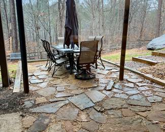 Outdoor dining room table, chairs and umbrella