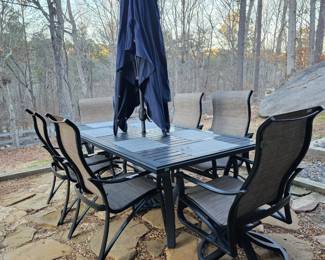 Tropitone Amici table and chairs with umbrella.
