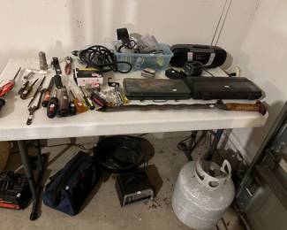 Socket sets, chargers tools and fantastic sword.