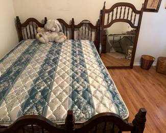 Full size bed and mirror for matching dresser.