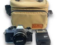 Nikon FG-20 35mm SLR Film Camera w/ A Nikon Series E 50mm F/1.8 Lens And A L.L. Bean Carrying Case!
