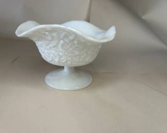 Vintage Westmoreland White Glass Maple Leaf Bramble Pedestal Bowl
Dimensions: 4.5" Height x 7" Top Circumference x 3.5" Bottom Circumference
This bowl was purchased new and remained with the original owner. She is downsizing and is now available for purchase.
Disclosures: This set is in excellent condition with no chips or signs of wear. (Please see the pictures for details.)
Background Westmoreland Glass:
Westmoreland's Milk Glass, made by Westmoreland in the 1920s, was the most remarkable and prolific product this company manufactured. According to the Collector's Encyclopedia of Milk Glass by Betty and Bill Newbound, they were one of the top producers of fine-quality milk glass in the United States. This includes the ever-popular hen-on-nest-covered dishes, first made of more delicate milk glass than the examples produced in the 1940s.
