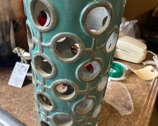 1960s to 1970s art pottery vase in aqua with o-ring cut outs