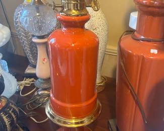1960s to 1970s orange ceramic vase with a brass square Greek Key accent base. This was a popular color in the 1960s to 1970s
