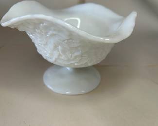 Vintage Westmoreland White Glass Maple Leaf Bramble Pedestal Bowl
Dimensions: 4.5" Height x 7" Top Circumference x 3.5" Bottom Circumference
This bowl was purchased new and remained with the original owner. She is downsizing and is now available for purchase.
Disclosures: This set is in excellent condition with no chips or signs of wear. (Please see the pictures for details.)
Background Westmoreland Glass:
Westmoreland's Milk Glass, made by Westmoreland in the 1920s, was the most remarkable and prolific product this company manufactured. According to the Collector's Encyclopedia of Milk Glass by Betty and Bill Newbound, they were one of the top producers of fine-quality milk glass in the United States. This includes the ever-popular hen-on-nest-covered dishes, first made of more delicate milk glass than the examples produced in the 1940s.