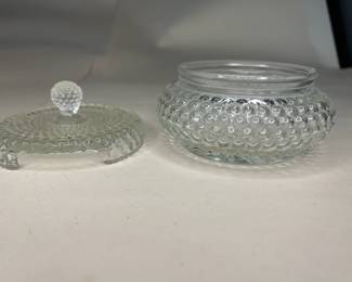 Vintage Anchor Hocking Hobnail Vanity Powder Glass Bowl with Lid
This vanity powder holder was purchased new in the 1960s and remained with the original owner. She is downsizing and is now available for purchase.
Disclosures: This set is in excellent condition with normal signs of wear for a piece of this age. No chips or cracks are present. (Please see the pictures for details.)
Dimensions with Lid: 3.5" Height x 4.5" Top Circumference of the Lid
Dimensions of Dish without the Lid: Height Approximately 2.5" x 3.5" Top 3.25" Circumference x Bottom Circumference
Weight: 10.8 Ounces