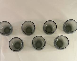 Vintage Mid-Century Modern 1970s Falcons Set of 7 Smoke Gray Tumblers
Each team had a set of lowball cocktail glasses commissioned by the NFL sometime in the 1970s. They are generous 10oz bowls of clear smokey grey blown glass. Each glass is printed in a monochrome tone with both the official NFL logo on one side and the Atlanta Falcons helmet on the other.
Dimensions: Top Circumference 3” x Bottom Circumference 1.5” x Height 3.25”
This set was purchased new and remained with the original owner. She is downsizing and is now available for purchase.
Disclosures: This set is in excellent condition with normal signs of wear for glasses of this age. (Please see the pictures for details.)