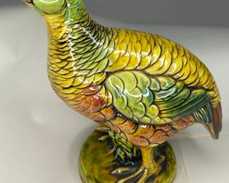An imperious grouse in turquoise, mustard, and paprika tones. Enesco paper label and stamp on the underside of the base.
This piece was purchased new in the 1960s and remained with the original owner. She is downsizing and is now available for purchase.
Dimensions: 8" Width x 4 5/8" Depth x 10 5/8" Height
Disclosures: This piece is in great condition with normal wear, including one chip in the beak area. (Please see the pictures for details.