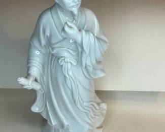 Rare Large Antique, Very Detailed Chinese Dehua Porcelain Statue or figurine of “The Wise Man” carrying a scroll and appearing to be deeply thought. Dehua Porcelain, more traditionally known in the West as Blanc de Chine, is a type of white Chinese porcelain made at Dehua in the Fujian province. It has been produced from the Ming dynasty to the present day. Dehua Porcelain Is the top tier of porcelain works and can be distinguished from others by the fine details in the work, giving it lifelike features.
This piece was purchased in the 1960s and remained with the owner. She is downsizing and is now available for purchase.
Disclosures: This set is in pristine condition with no chips or cracks. (Please see the pictures for details.)
Dimensions: 4ʺ Wide × 4ʺ Deep × 10ʺ Height