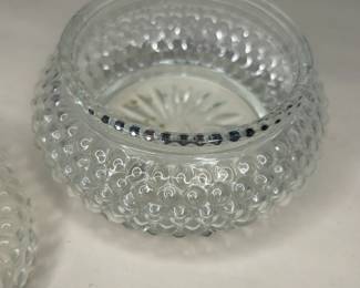 Vintage Anchor Hocking Hobnail Vanity Powder Glass Bowl with Lid
This vanity powder holder was purchased new in the 1960s and remained with the original owner. She is downsizing and is now available for purchase.
Disclosures: This set is in excellent condition with normal signs of wear for a piece of this age. No chips or cracks are present. (Please see the pictures for details.)
Dimensions with Lid: 3.5" Height x 4.5" Top Circumference of the Lid
Dimensions of Dish without the Lid: Height Approximately 2.5" x 3.5" Top 3.25" Circumference x Bottom Circumference
Weight: 10.8 Ounces