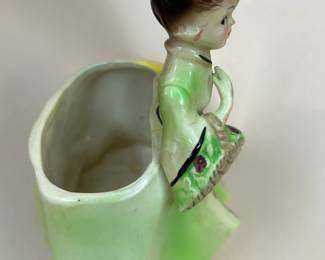 Vintage 1970s Vintage Figurine Planter Young Girl with Basket
- minor chips due to normal wear of a piece this age, and her shoulder was well repaired with glue. See photos for details.
Dimensions: Approximately 6" Height x 4.5" Width x 4" Deep
Weight: 1.1 Pounds