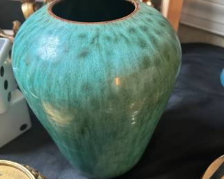 Early 20th-century Chinese ceramic vase. This antique farmhouse-style ceramic jar has a beautifully aged emerald green glazed finish. This lovely antique pot was initially used to store honey or oil.