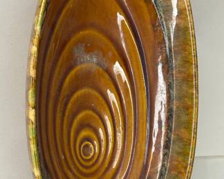 Vintage 1970s Brown Ceramic, Glaze Pottery With Oblong Design In Oval Serving Bowl/ Dish, Unsigned, Circa 1970s
Dimensions: 12.5" Length x 7.5" Width x 3" Height
This piece was purchased new in the 1960s and remained with the original owner. She is downsizing and is now available for purchase.
Disclosures: This set is in excellent condition with normal signs of wear for a piece this age. (Please see the pictures for details.)