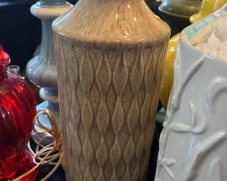 A circa 1960's single French glazed porcelain table lamp.
Measurements:
Height of body: 18"
Height to shade rest: 28"
Diameter: 6".