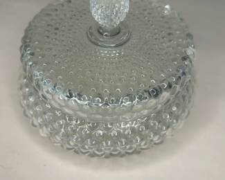 Vintage Anchor Hocking Hobnail Vanity Powder Glass Bowl with Lid
This vanity powder holder was purchased new in the 1960s and remained with the original owner. She is downsizing and is now available for purchase.
Disclosures: This set is in excellent condition with normal signs of wear for a piece of this age. No chips or cracks are present. (Please see the pictures for details.)
Dimensions with Lid: 3.5" Height x 4.5" Top Circumference of the Lid
Dimensions of Dish without the Lid: Height Approximately 2.5" x 3.5" Top 3.25" Circumference x Bottom Circumference
Weight: 10.8 Ounces