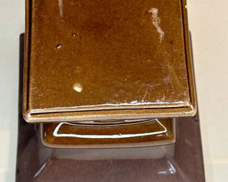 Vintage 1970s Brown Ceramic Glazed Tall Planter
wear due for a piece this age, chips in the rim, no cracks. See photos for details.
Dimensions: Approximately 6" Height x 6.5" Top Square x 4" Bottom Square
Weight: 2 Pounds