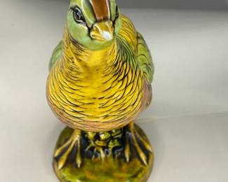An imperious grouse in turquoise, mustard, and paprika tones. Enesco paper label and stamp on the underside of the base.
This piece was purchased new in the 1960s and remained with the original owner. She is downsizing and is now available for purchase.
Dimensions: 8" Width x 4 5/8" Depth x 10 5/8" Height
Disclosures: This piece is in great condition with normal wear, including one chip in the beak area. (Please see the pictures for details.