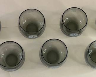 Vintage Mid-Century Modern 1970s Falcons Set of 7 Smoke Gray Tumblers
Each team had a set of lowball cocktail glasses commissioned by the NFL sometime in the 1970s. They are generous 10oz bowls of clear smokey grey blown glass. Each glass is printed in a monochrome tone with both the official NFL logo on one side and the Atlanta Falcons helmet on the other.
Dimensions: Top Circumference 3” x Bottom Circumference 1.5” x Height 3.25”
This set was purchased new and remained with the original owner. She is downsizing and is now available for purchase.
Disclosures: This set is in excellent condition with normal signs of wear for glasses of this age. (Please see the pictures for details.)