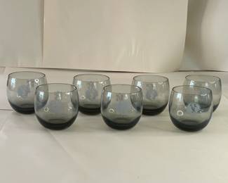 Vintage Mid-Century Modern 1970s Falcons Set of 7 Smoke Gray Tumblers
Each team had a set of lowball cocktail glasses commissioned by the NFL sometime in the 1970s. They are generous 10oz bowls of clear smokey grey blown glass. Each glass is printed in a monochrome tone with both the official NFL logo on one side and the Atlanta Falcons helmet on the other.
Dimensions: Top Circumference 3” x Bottom Circumference 1.5” x Height 3.25”
This set was purchased new and remained with the original owner. She is downsizing and is now available for purchase.
Disclosures: This set is in excellent condition with normal signs of wear for glasses of this age. (Please see the pictures for details.)