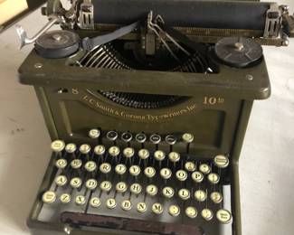 This Antique L C Smith & Corona Typewriter is a great piece to add to your collection.
It has an extra large carriage and would look awesome on a bookshelf or on an antique desk.
Or place it on a bookshelf in your den, library, or anywhere else in your home!
This Model 8 was made in 1929 and has the original serial number on the back. It has an 18-inch carriage.
This gorgeous typewriter requires a new ribbon.
All of the keys are intact!
It measures approximately 21 inches wide by 14 1/2 inches deep by 10 inches tall.