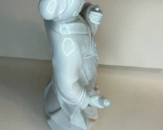 Rare Large Antique, Very Detailed Chinese Dehua Porcelain Statue or figurine of “The Wise Man” carrying a scroll and appearing to be deeply thought. Dehua Porcelain, more traditionally known in the West as Blanc de Chine, is a type of white Chinese porcelain made at Dehua in the Fujian province. It has been produced from the Ming dynasty to the present day. Dehua Porcelain Is the top tier of porcelain works and can be distinguished from others by the fine details in the work, giving it lifelike features.
This piece was purchased in the 1960s and remained with the owner. She is downsizing and is now available for purchase.
Disclosures: This set is in pristine condition with no chips or cracks. (Please see the pictures for details.)
Dimensions: 4ʺ Wide × 4ʺ Deep × 10ʺ Height