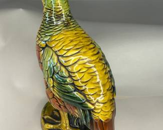 An imperious grouse in turquoise, mustard, and paprika tones. Enesco paper label and stamp on the underside of the base.
This piece was purchased new in the 1960s and remained with the original owner. She is downsizing and is now available for purchase.
Dimensions: 8" Width x 4 5/8" Depth x 10 5/8" Height
Disclosures: This piece is in great condition with normal wear, including one chip in the beak area. (Please see the pictures for details.