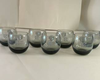 Vintage Mid-Century Modern 1970s Falcons Set of 7 Smoke Gray Tumblers
Each team had a set of lowball cocktail glasses commissioned by the NFL sometime in the 1970s. They are generous 10oz bowls of clear smokey grey blown glass. Each glass is printed in a monochrome tone with both the official NFL logo on one side and the Atlanta Falcons helmet on the other.
Dimensions: Top Circumference 3” x Bottom Circumference 1.5” x Height 3.25”
This set was purchased new and remained with the original owner. She is downsizing and is now available for purchase.
Disclosures: This set is in excellent condition with normal signs of wear for glasses of this age. (Please see the pictures for details.)