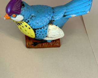 Vintage Norleans Blue Bird with Original Branding Sticker on Bottom - Good Condition
This piece was purchased new in the 1960s and remained with the original owner. She is downsizing and is now available for purchase.
This Vintage Norleans Japan figurine of a colorful blue bird features an orange beak, a yellow chest, and a purple plume.
Dimensions: 6.25" Long x 4.5" High x 2.75" Deep (NOTE all measurements approximate given the shape of the figurine.)
Disclosures: Some chipping is present - see photos for detailed images.