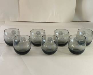 Vintage Mid-Century Modern 1970s Falcons Set of 7 Smoke Gray Tumblers
Each team had a set of lowball cocktail glasses commissioned by the NFL sometime in the 1970s. They are generous 10oz bowls of clear smokey grey blown glass. Each glass is printed in a monochrome tone with both the official NFL logo on one side and the Atlanta Falcons helmet on the other.
Dimensions: Top Circumference 3” x Bottom Circumference 1.5” x Height 3.25”
This set was purchased new and remained with the original owner. She is downsizing and is now available for purchase.
Disclosures: This set is in excellent condition with normal signs of wear for glasses of this age. (Please see the pictures for details.)