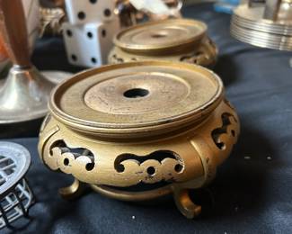 This photo is of gold painted rosewood bases. These are Chinese and are for placing porcelain or cloisonne vases on.