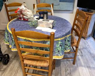 ladder ball chairs and a white round dining table!