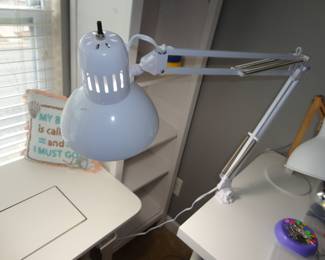 Pair of tall shelves (in the background) that are still attached to the wall with the kid straps but can be removed after the sale.