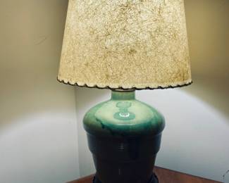 Antique pottery base lamp with rawhide shade