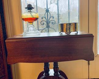 Duncan Phyffe smaller double drop leaf wood table, oil lamp