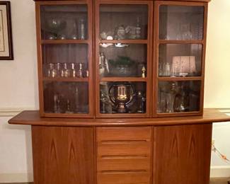 Modern wood China cabinet, large solid brass eagle, sets of crystal wine goblets & Asian gilded glassware
