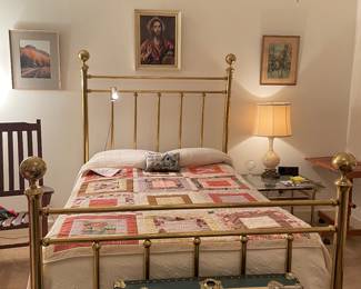 Full brass bed, wood trunk, wood rocking chair, brass & glass table, framed art
