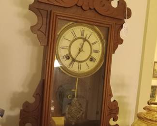 Waterbury Carved wooden eight day mantle clock