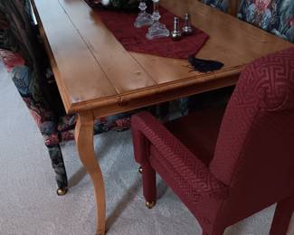 Cherrywood diningroom table by Bausman and Company, like new condition, was $765.00 now only $400.00.