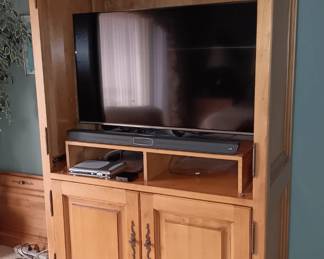 Large wardrobe/entertainment cabinet, the 2 doors are off but can be put back on, 48"W x 26"D x 85"H. * $265.00*