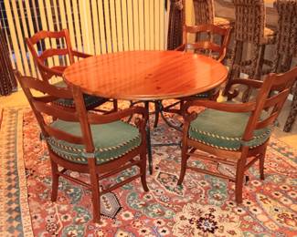 Very cool round wooden table (47" in diameter) with iron legs and 4 chairs, like new condition. Was *$685.00* now only $300.00.