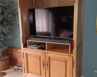 Large wardrobe/entertainment cabinet, the 2 doors are off but can be put back on, 48"W x 26"D x 85"H. * $265.00*