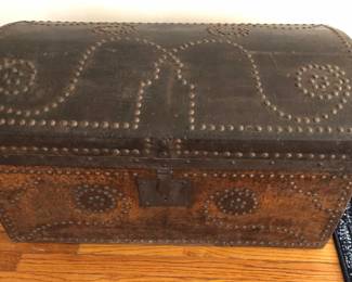 Interesting old domed leather trunk with metal stud decoration