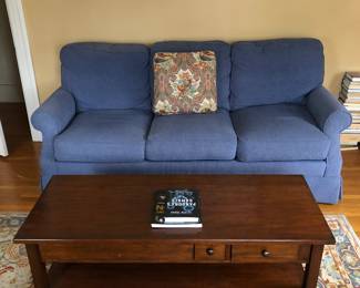 Wesley Hall sofa and nice coffee table and good wool rug