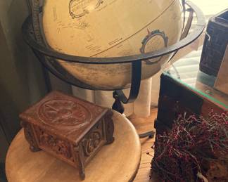 Floor globe; small stool