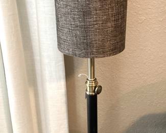 One of two slender lamps